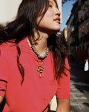Collar Wishbone y flor